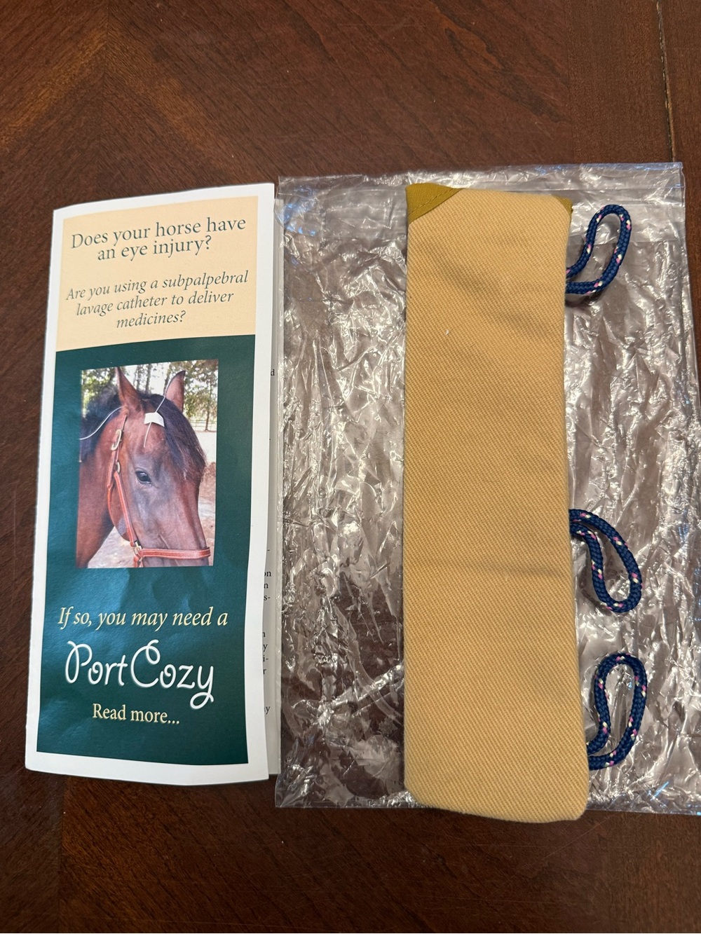 Does your horse have an eye injury ? Port cozy tan cloth holds lavage catheter